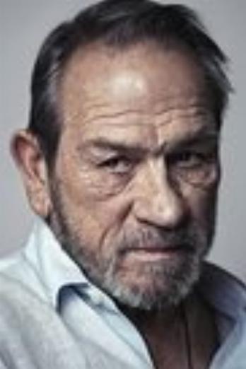 Tommy Lee Jones isEd Tom Bell
