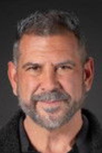 Mike Hickman isRefugee (uncredited)