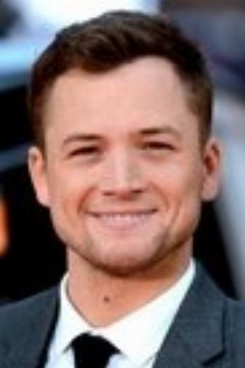 Taron Egerton isHenk Rogers