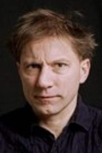 Simon McBurney isAtlee